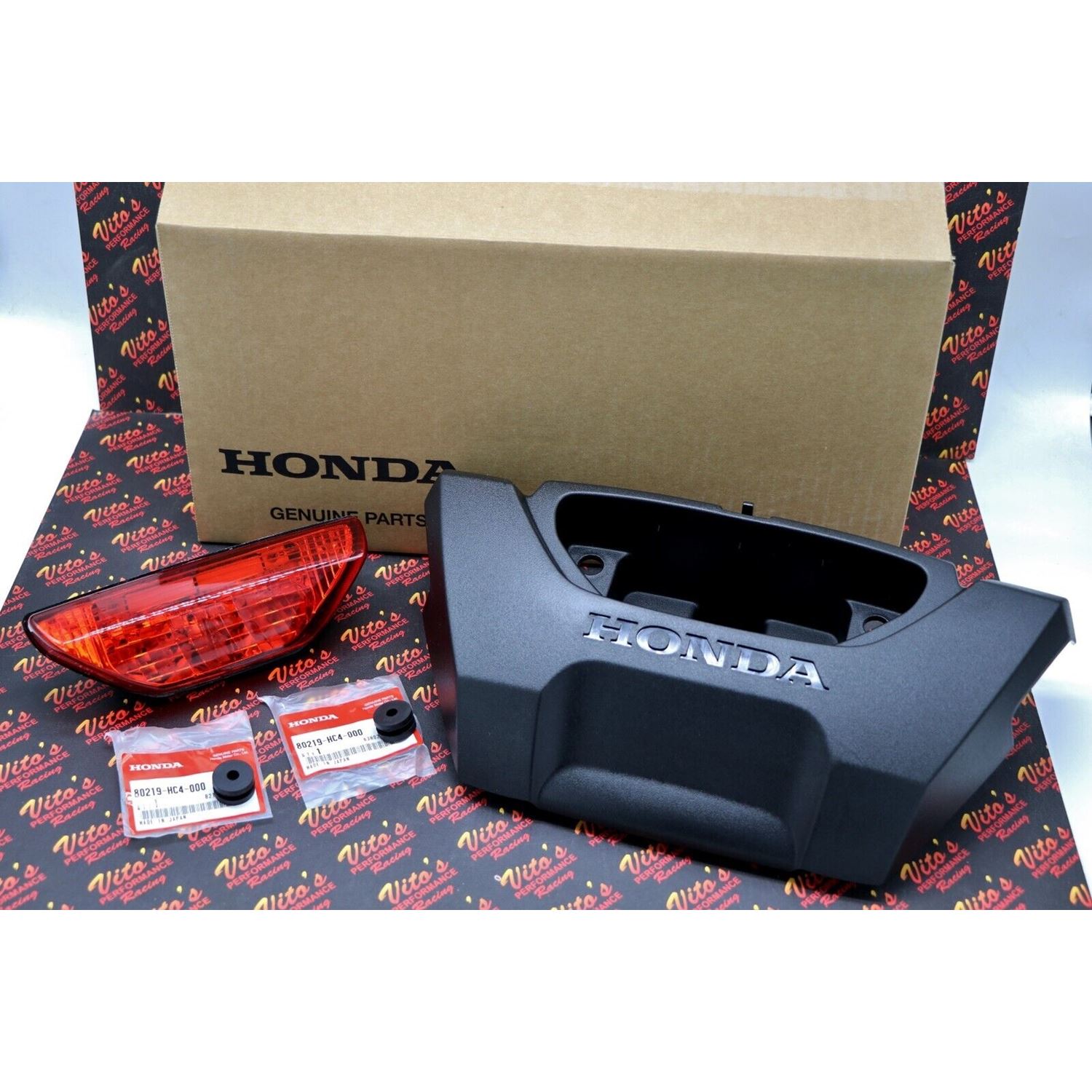 Honda rear taillight + plastic tool box lid Forema
